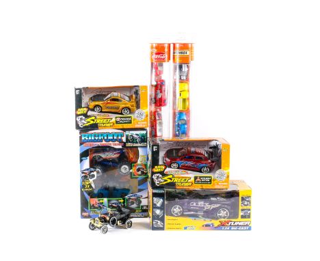 65 vehicles / vehicle packs by various makes. Including; Johnny Lightning vehicles. Mini Cooper play set. Tinplate VW camperv