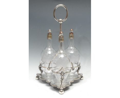 A late 19th century three bottle decanter stand, posted lop handle, the globular bottles engraved with pheasants, 45cm high 