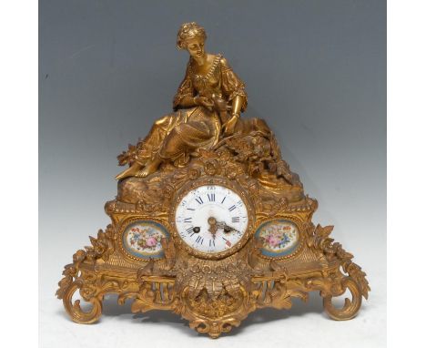 A 19th century French gilt-metal and porcelain mounted mantel clock, 6.5cm circular enamel dial inscribed Le Roy &amp; Fils, 