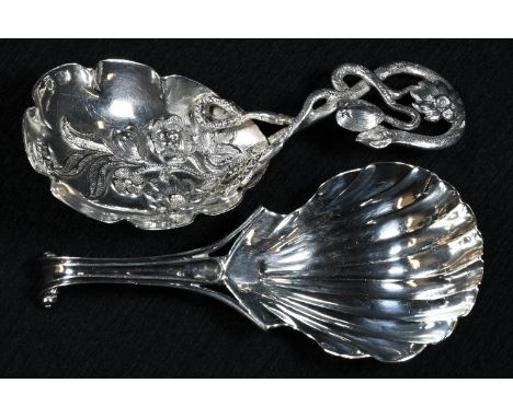 A Victorian silver caddy spoon, stamped and embossed with flowering stems, 8.5cm long, Hilliard &amp; Thomason, Birmingham 18