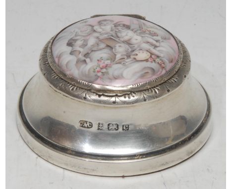 A late Victorian lady's silver and enamel rouge pot, the domed cover with an inset enamel plaque painted with amorini allegor