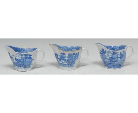 A Caughley/Coalport low Chelsea ewer, decorated in blue with chinoiserie scene. 7cm high, c.1780;  others (3) 