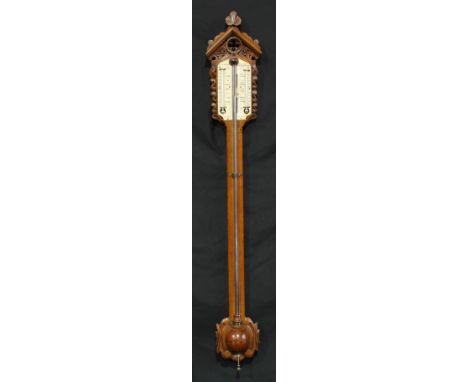 A Victorian Neo-Gothic oak stick barometer, 10cm ivorine register inscribed: J. Hughes, 21 & 22 London St., City & Ratcliffe,