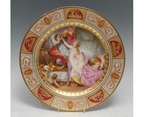 A Vienna circular plate, signed by Wagner, entitled Tannhauser, decorated with classical figures and cherubs, the rim  altern