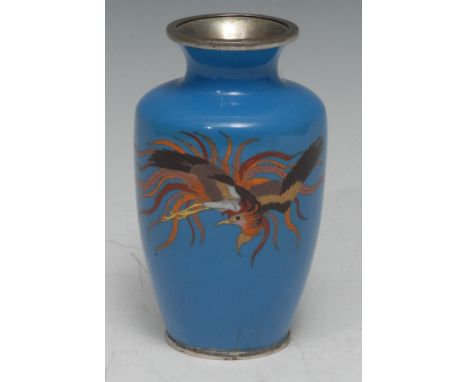 A Chinese cloisonne enamel ovoid vase, decorated in polychrome with a phoenix, on a pale blue ground, 12.5cm high, early 20th
