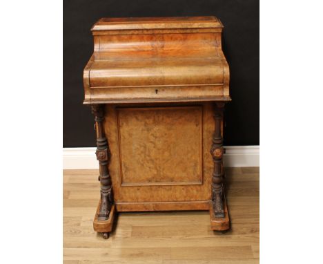 A Victorian burr walnut piano-top Davenport desk, 'pop-up' superstructure fitted for stationery, the hinged cover enclosing a