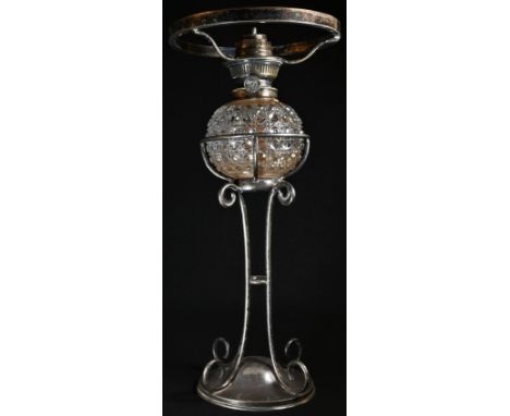 A late Victorian E.P.N.S table oil lamp, adjustable burner, The Wizard, hobnail-cut clear glass reservoir, scroll supports, d