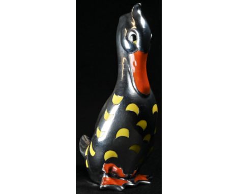 An early 20th century novelty silver overlaid perfume bottle, as a duck, the pierced silver matrix over a ceramic body glazed