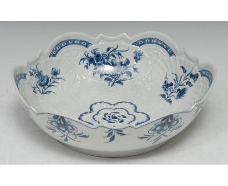 A Worcester junket dish or salad bowl, moulded in relief and painted with flowers and foliage, cell border, 25cm diam, cresce