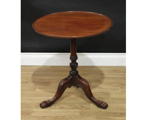 A George III Revival mahogany tripod occasional table, of small and low proportions, dished circular tilting top, turned and 