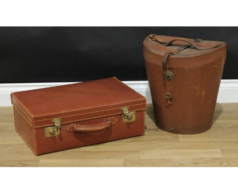 Vintage Luggage - an early 20th century tan leather travelling hat box, brass lock plate, 40cm high, 37cm wide; a tan leather