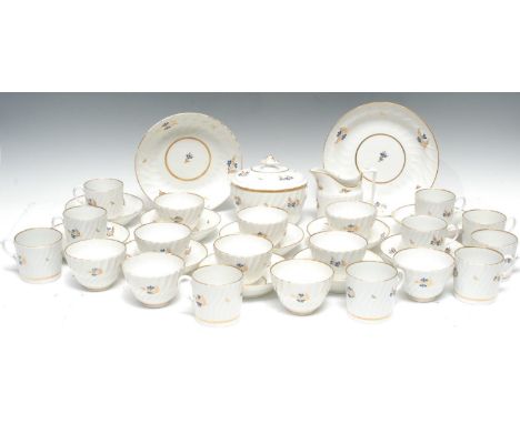 An 18th century Coalport tea and coffee service, for ten, comprising coffee cans, tea bowls, saucers, sucrier and cover, milk