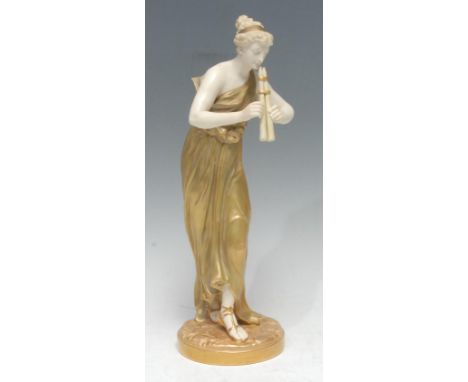 A Royal Worcester figure, of a classical maiden playing pipes, she stands, dressed in a long flowing dress, coloured in tones