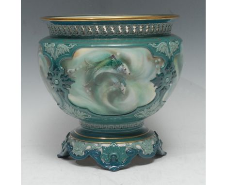 A Hadley's Worcester jardiniere, moulded in relief with four panels each painted with fish, in tones of blue, pierced everted