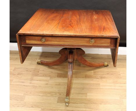 A 'Regency' rectangular rosewood crossbanded mahogany sofa table, top above a long cockbeaded frieze drawer, verso conforming