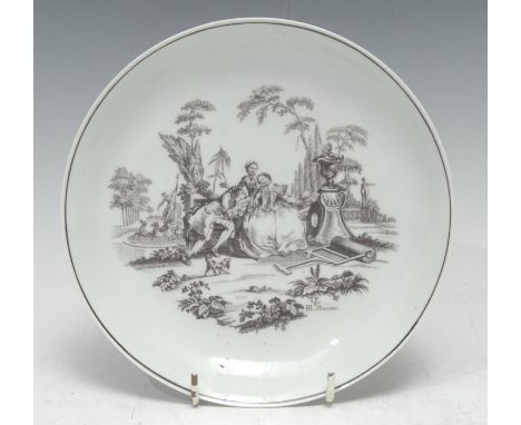 A Worcester saucer shaped dish, after Robert Hancock, signed RH Worcester with anchor.  printed in monochrome with L? Amour, 