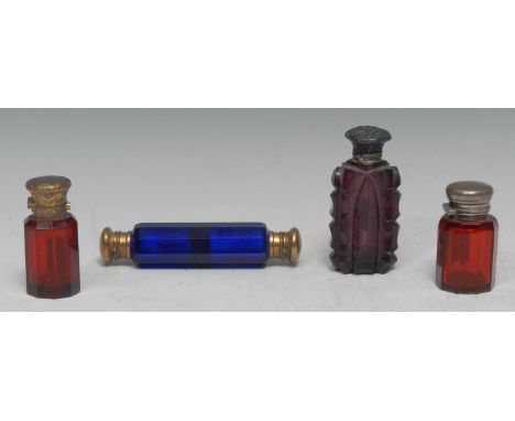 A Victorian double ended faceted cobalt blue scent bottle, hinged domed plated covers, 13cm long, c.1860;  a Victorian facett
