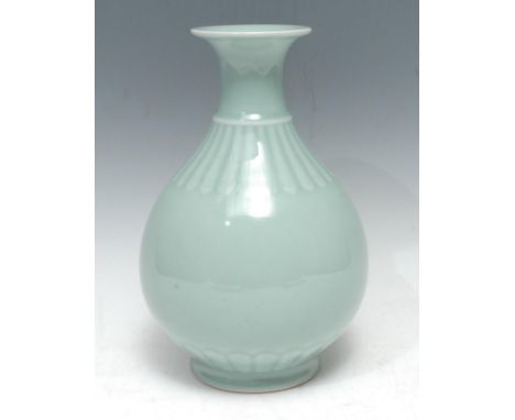 A Chinese celadon ovoid vase, fluted neck, 25cm high, Qianlong seal mark 