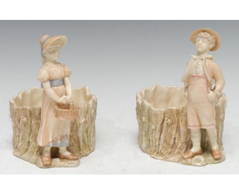 A pair of Royal Worcester figural jardinieres, modelled by James Hadley, of a boy and a girl, standing by coopered barrels, 1
