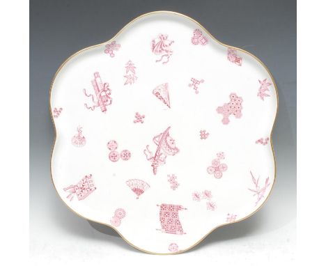 A Royal Worcester shaped circular cabaret tray, in the Aesthetic taste,  printed with Japanese fans, mons and symbols, gilt l