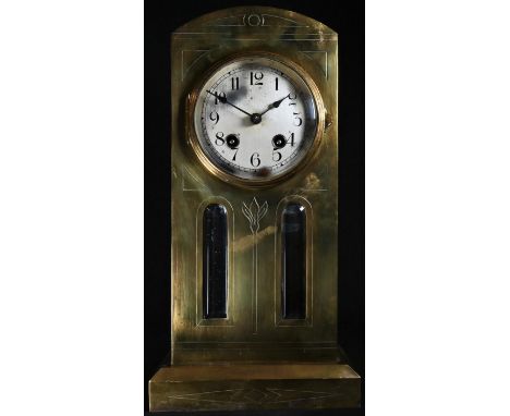 A Jugendstil brass mantel clock, 10cm convex silvered dial inscribed with Arabic numerals, eight-day movement by the Hamburg 