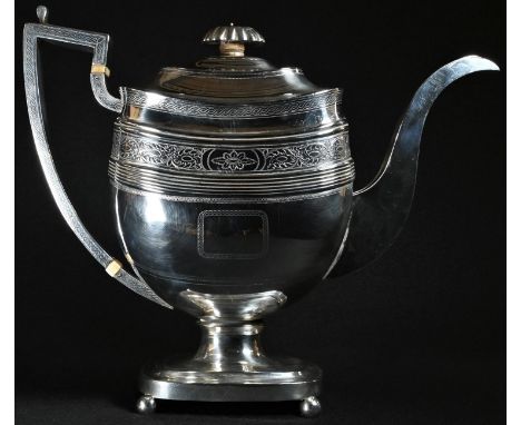 A George III silver boat shaped pedestal coffee pot, hinged domed cover with fluted knop finial, capped angular scroll handle