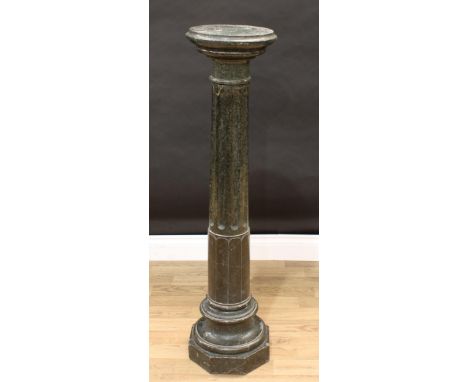 A 19th century serpentine statuary pedestal, circular top, fluted pillar, octagonal base, 110cm high, 27cm diameter, c.1860 