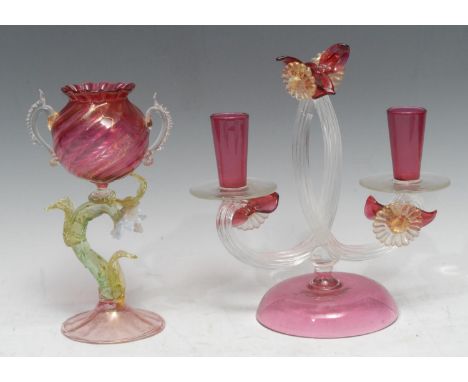 A 19th century fancy glass vase, with wrythen globular cranberry vase supported on vaseline leafy stem, slight domed base wit