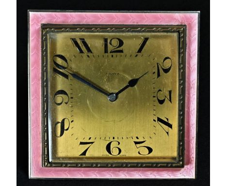 An early 20th century silver coloured metal and pink guilloche enamel easel boudoir timepiece, 6cm square gilt dial inscribed