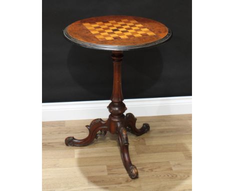 A Victorian walnut tripod games table, circular top inlaid for chess, turned and fluted pillar, cabriole legs, 70cm high, 54c