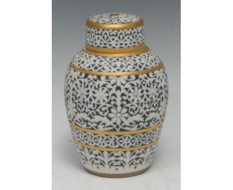 A Graingers Worcester ovoid jar and cover, in light relief with Isnik scrolls, on a blue ground, gilt line borders, 15cm high