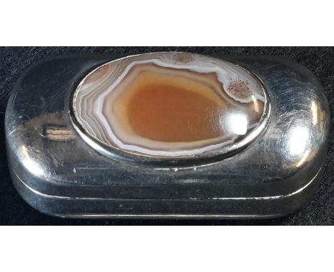 A 19th century agate mounted silver snuff box, probably Scottish, hinged cover set with a polished stone, gilt interior, 5cm 