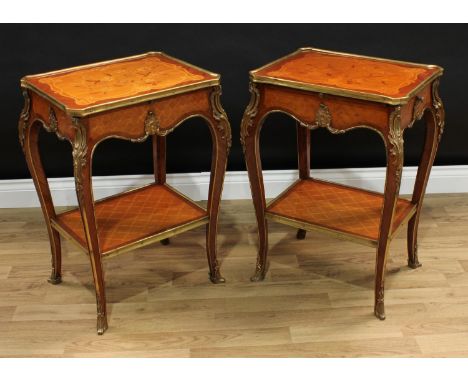 A pair of Louis XV style gilt metal mounted kingwood and marquetry side tables, each canted rectangular top inlaid with flowe