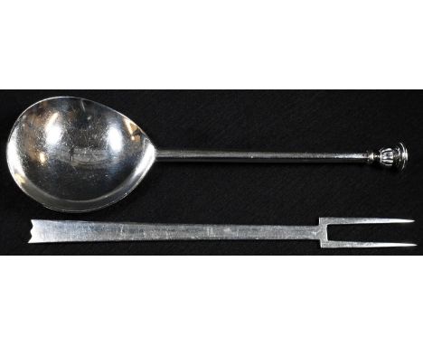A 17th century style silver seal top spoon, 16cm long, Thomas Bradbury &amp; Sons Ltd, Sheffield 1908; a George V silver anti