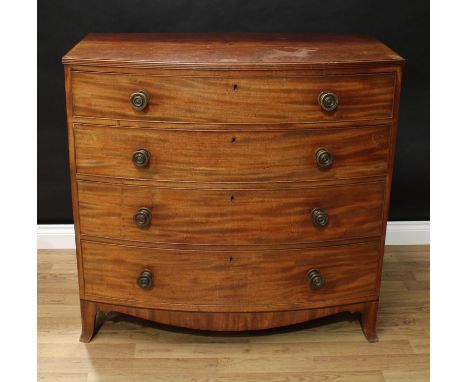 A Regency mahogany bow-fronted chest, moulded top above four long graduated cockbeaded drawers, brass drum handles, shaped ap