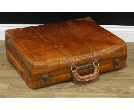 Vintage Luggage - a tan crocodile leather gentleman's suitcase, the tweed-lined interior fitted for travel, brass and silvere