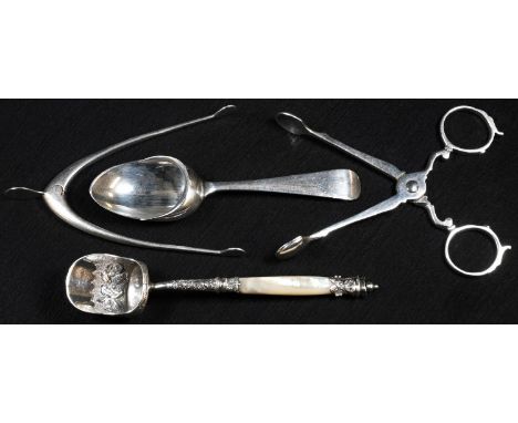 A George V silver Old English pattern medicine spoon, Sheffield 1917; a late Victorian silver sugar scoop or caddy spoon, mot