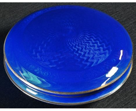 A Continental silver and guilloche enamel bun shaped box and cover, engine turned and decorated in tones of deep blue,gilt in
