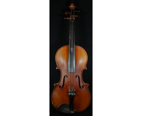 A violin, the two-piece back 36cm long excluding button, outlined throughout with purfling, 60cm long overall 