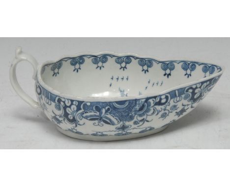 A Worcester Donut Tree pattern sauce boat, decorated in under glaze blue with stylised trees and foliage, the exterior with i