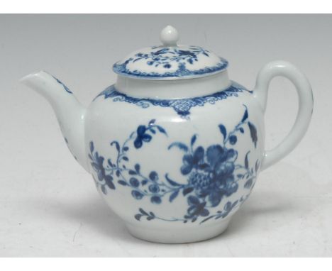 A Worcester small size teapot and cover,  painted with trailing flowers in under glaze blue, 12cm high,  workman?s mark 