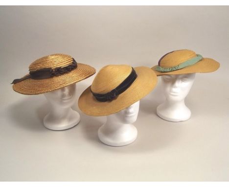 VINTAGE HATS.
Three vintage woven straw hats.