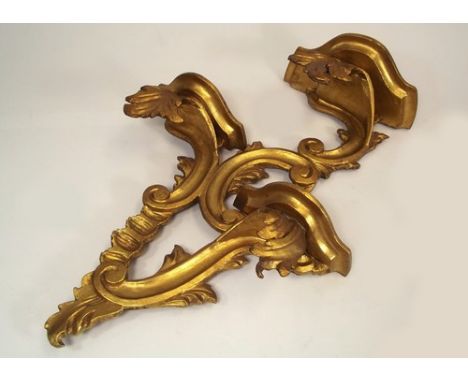 WALL BRACKET.
A carved gilt wood, three shelf wall bracket.
Height 46cm.