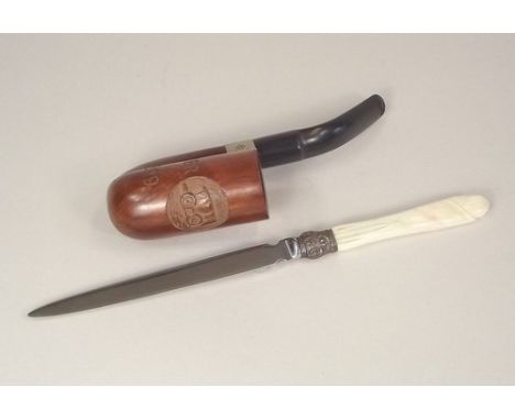 BOER WAR PIPE ETC. 
A Boer war pipe with carved bowl & a paper knife.