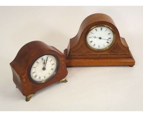 MANTEL CLOCKS.
An Edwardian inlaid oak mantel clock & one other clock.