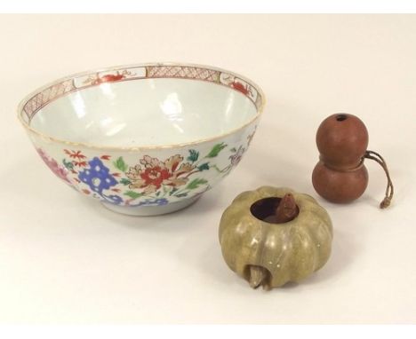 CHINESE BOWL ETC.
An 18th century Chinese famille rose bowl (a.f.) & a Japanese soap stone brush washer & two other pieces.