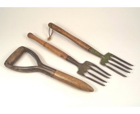 GARDENING TOOLS.
Two long handled gardening forks & a large dibber.
