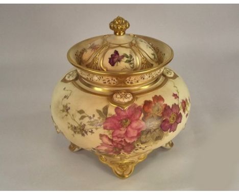 ROYAL WORCESTER.
A Royal Worcester pot pourri vase & cover. Shape 1194, Rd. No.63495. Height 19.5cm.