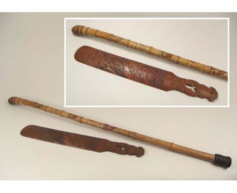 WALKING STICK ETC.
A Japanese carved bamboo walking stick & an oriental paper smoother, carved a hawk & a hare. Length of smo