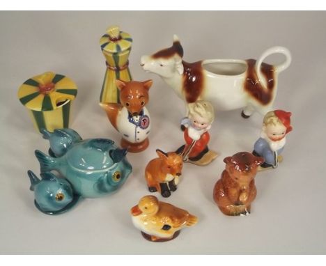 GOEBEL CONDIMENTS ETC.
Goebel girl & boy skier condiments, various single Goebel condiments & a Goebel cow creamer.